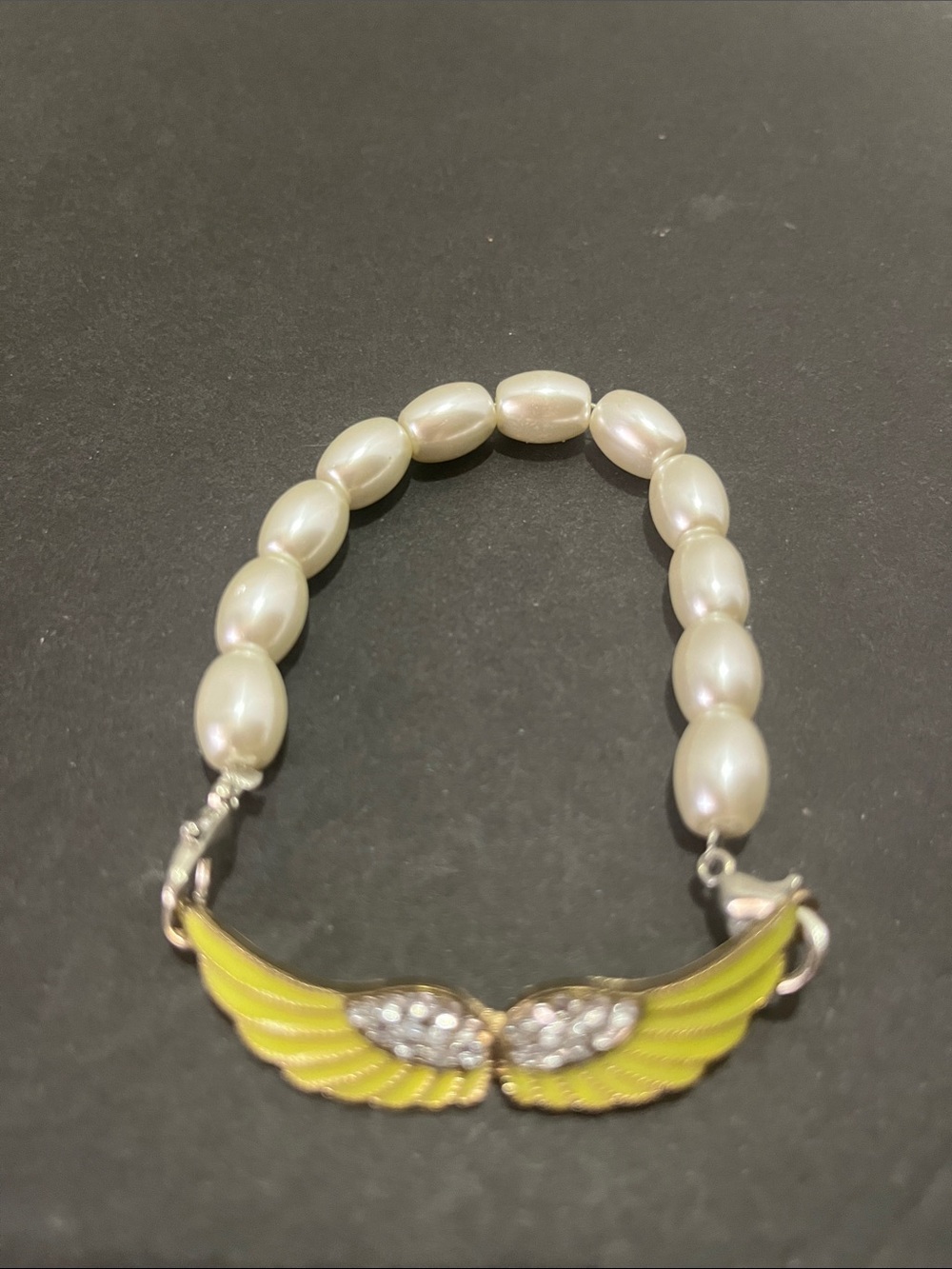 Pearl Bead Bracelet with Yellow Wing Accent